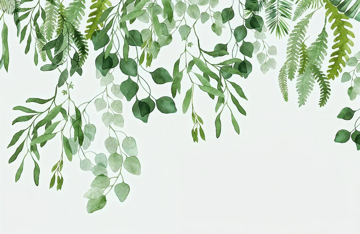 Cascading eucalyptus and fern leaves on a light background